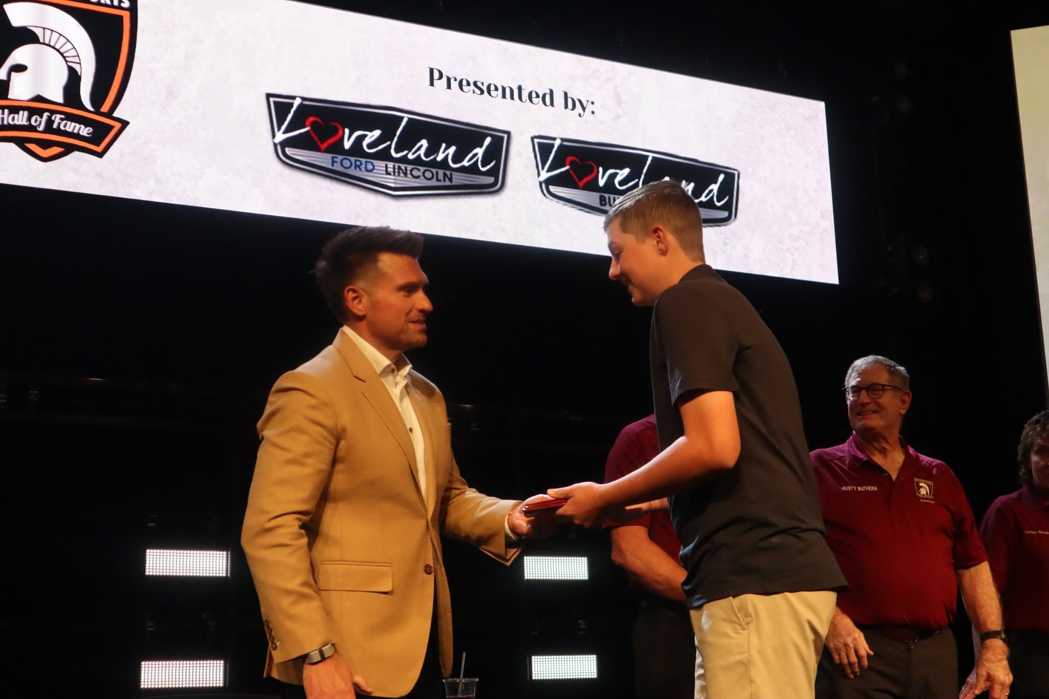 Handshake of honor at the induction ceremony